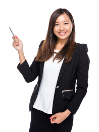 business woman use pen to point out