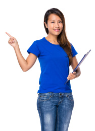woman with clipboard and finger point out