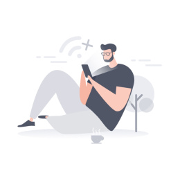 靠着树坐着玩手机的大叔