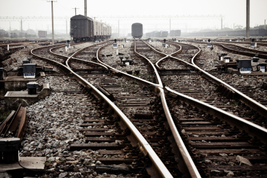 Railway in fog on station, outdoor landscape