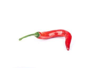 一条新鲜的辣椒放在白色背景上面