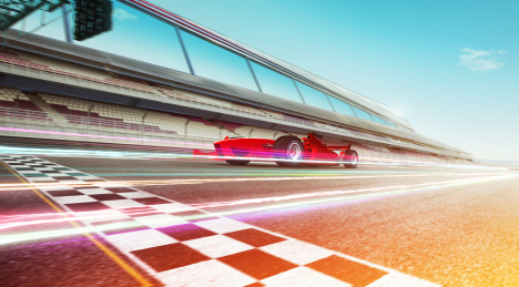 体育赛车快速驾驶实现冠军梦想，运动模糊和灯光效果使用。 