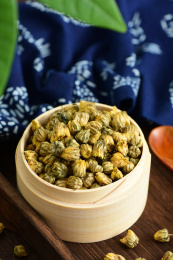复古中国风背景上的胎菊特写图片