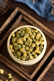 复古中国风背景上的胎菊特写图片