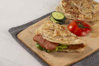 煎熟的台湾小吃粗粮原料手抓饼