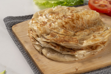 煎熟的台湾小吃粗粮原料手抓饼