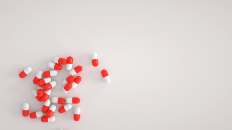 三维渲染的纯色背景的医疗科技胶囊药品