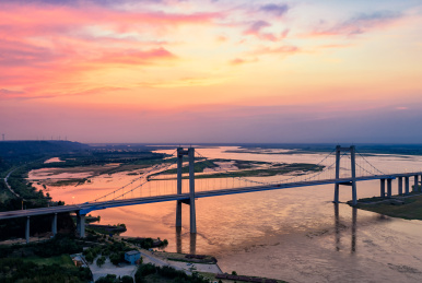 黄河中下游分界线郑州桃花峪景区黄河大桥日落风光