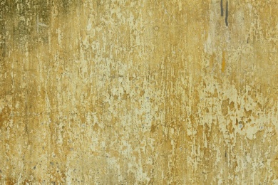 一面粗糙斑驳裂痕的白色墙面照片