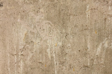 一面粗糙斑驳裂痕的白色墙面照片