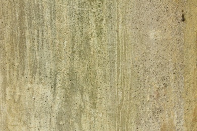 一面粗糙斑驳裂痕的白色墙面照片