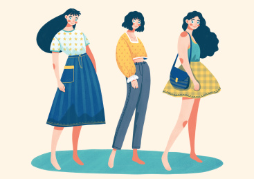 三个穿着时尚的女孩并排站着