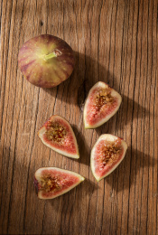 Delicious figs on the wooden floor
