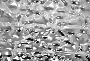 凹凸不同的银灰色金属反光表面纹理素材