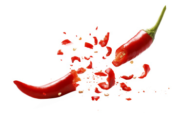  炸开喷溅碎片的红辣椒白底素材