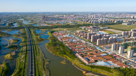 航拍山东东营市东营区绿色生态城市建筑公路风光