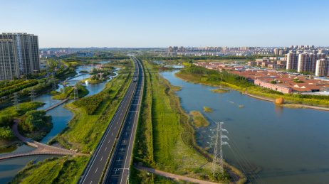 航拍山东东营市东营区绿色生态城市建筑公路风光