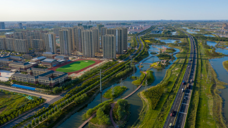 航拍山东东营市东营区绿色生态城市建筑公路风光