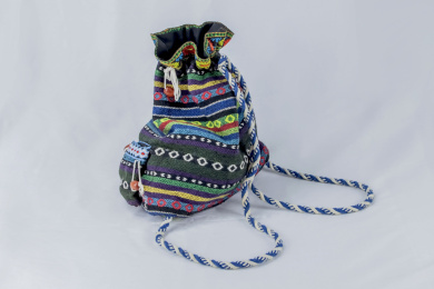 中国彝族生活装饰物女式背包静物工艺品