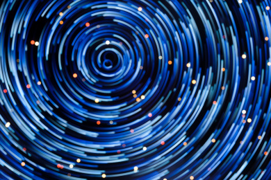 围绕中心旋转的发光粒子，三维渲染