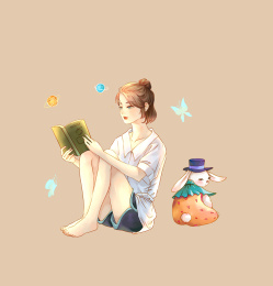 看书的白衣少女和兔子