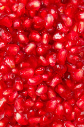 铺满新鲜石榴果粒的背景