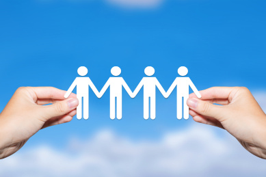 商务小人手拉手共同努力合作队伍包容概念