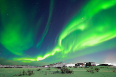 俄罗斯摩尔曼斯克小镇捷里别尔卡的北极光