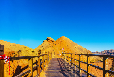 秋季蓝天下的的甘肃张掖七彩丹霞地貌群