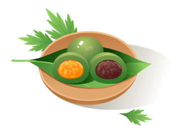 盘子里的三个青团和艾草