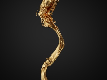 金色的流动液体与水花