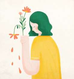 看着凋谢花朵伤心的女孩