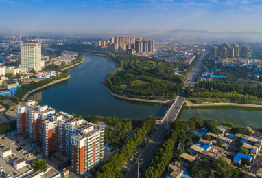 航拍中国河南禹州市颍河上的桥和两岸景观