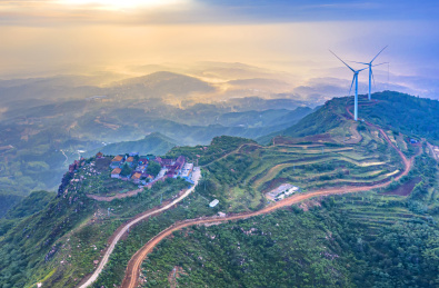 航拍中国河南禹州市九里山上的寺庙和风电