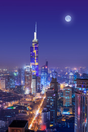 江苏省南京市夜晚月亮光照鼓楼中心高楼建筑