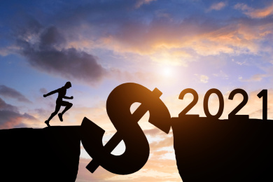 剪影小人跨越悬崖迎接2021年