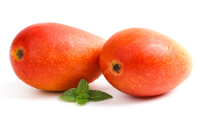 白底上放着两个完整的红金龙果