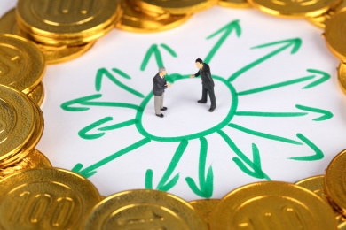 金币包围下的商人在谈生意