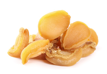 白底上放着一堆淡晒鲍鱼干