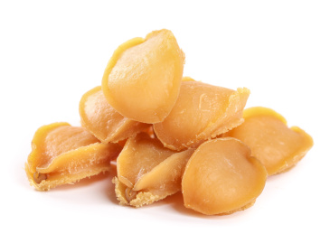 白底上放着一堆淡晒鲍鱼干