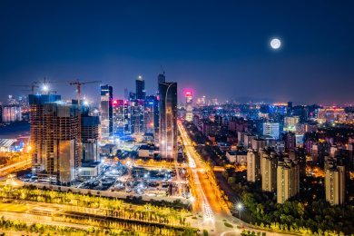 江苏省南京市夜晚月亮光照河西商圈高楼建筑