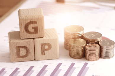 图表上的文字积木GDP和硬币