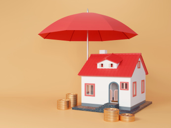 红色雨伞下面的红色卡通房子和金币
