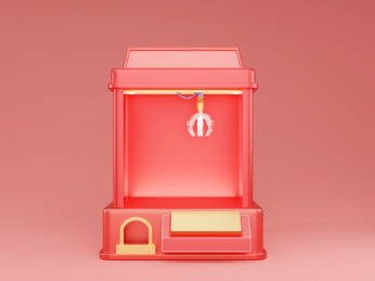 红色背景中的3D卡通游戏扭蛋机娃娃机