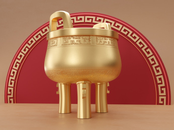 放在传统中式纹样前的三足金色圆鼎