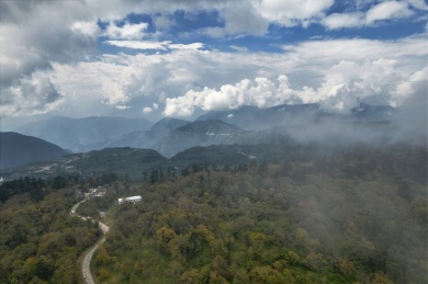 航拍川西高原横断山脉云雾中层层山脉风景