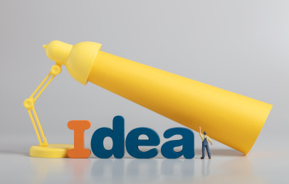 微缩创意黄色台灯下寻找灵感创意的人