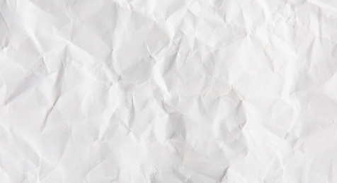 白色褶皱纸张纹理背景