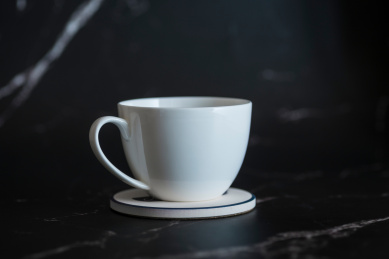 骨瓷咖啡杯和吸水陶瓷杯垫