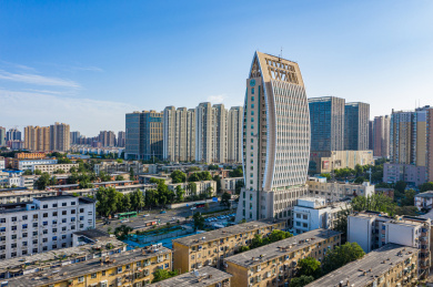 航拍郑州城市天际线树叶形状办公楼高楼大厦